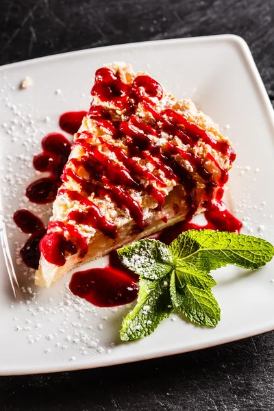 Sweet cake with berries with mint — Stock Photo, Image