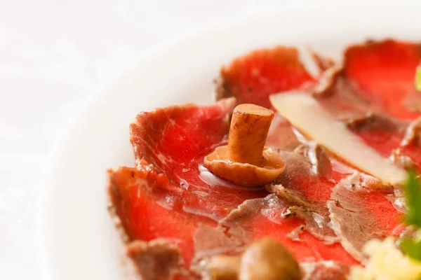 Meat carpaccio on plate — Stock Photo, Image