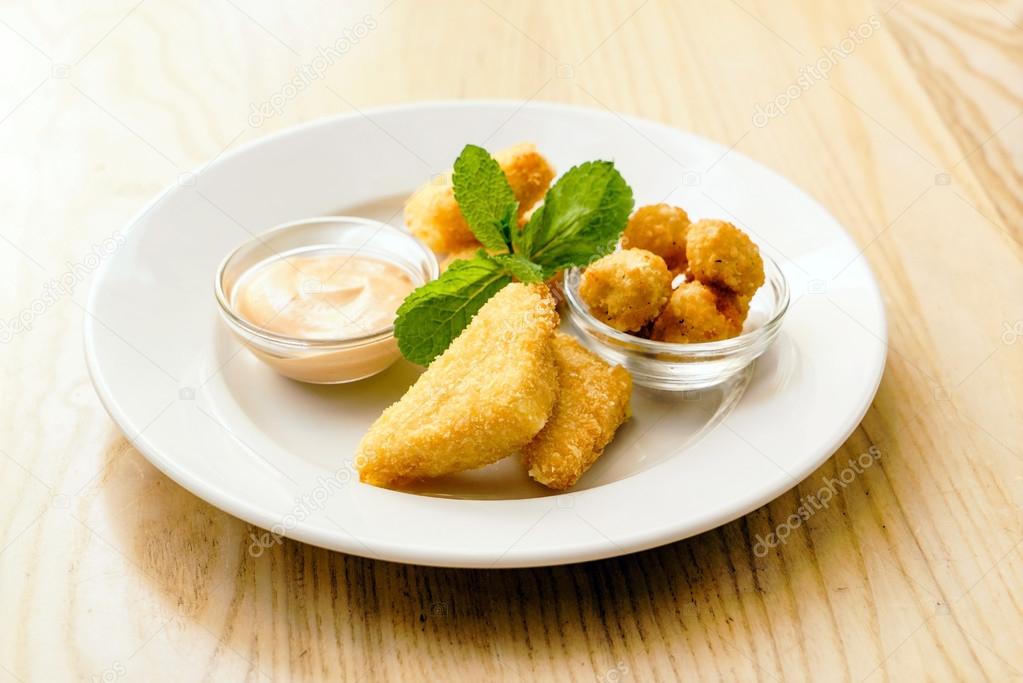 Fried cheese with sauce