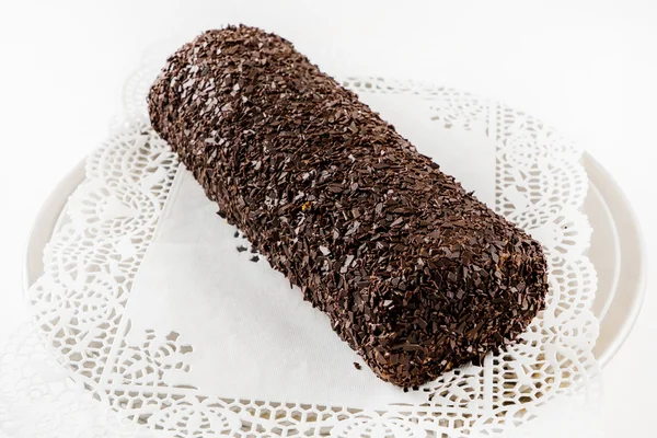 Rolled cake  on white — Stock Photo, Image