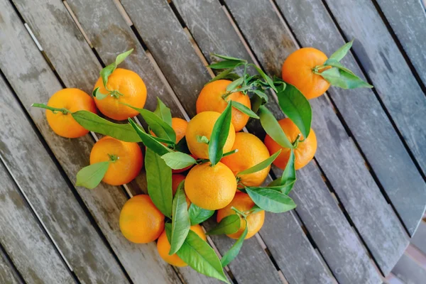 Fresh mandarines on table — Stock Photo, Image