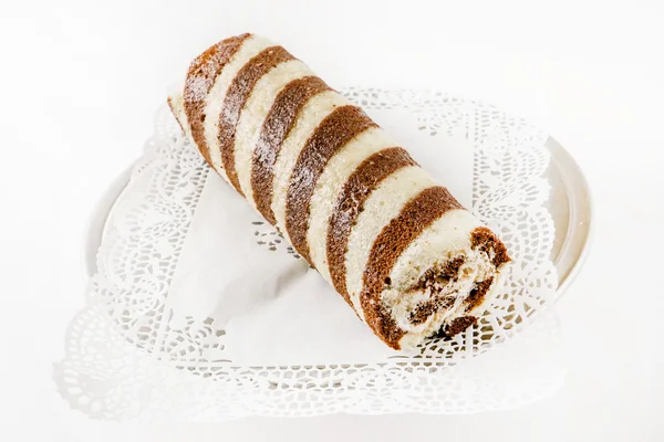 Rolled cake on white — Stock Photo, Image