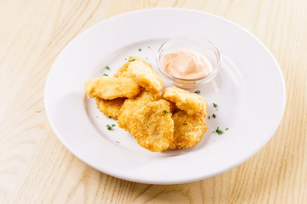 Chicken nuggets with sauce — Stock Photo, Image