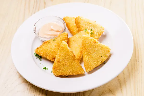 Fried cheese on plate — Stock Photo, Image