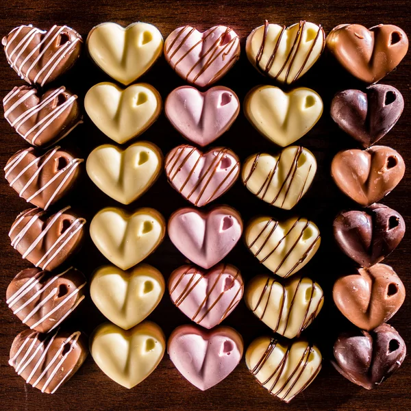 Valentine Chocolates on black — Stock Photo, Image
