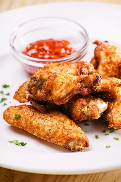 Tasty fried chicken with sauce — Stock Photo, Image
