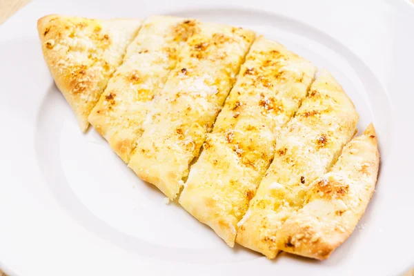 Focaccia with cheese on  plate — Stock Photo, Image