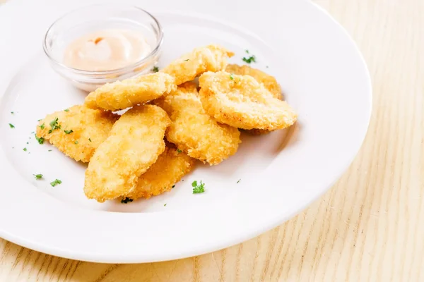 Chicken nuggets with sauce — Stock Photo, Image