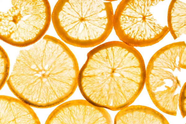 Fette arancioni su bianco — Foto Stock