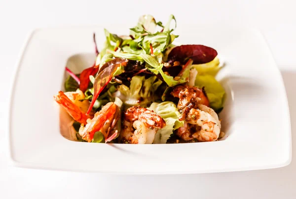 Salad with shrimps on plate — Stock Photo, Image