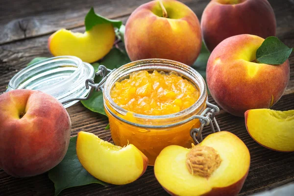 Peach jam and fresh peaches