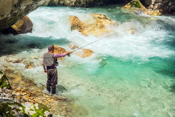 Fisherman fishing in river — Stock Photo, Image