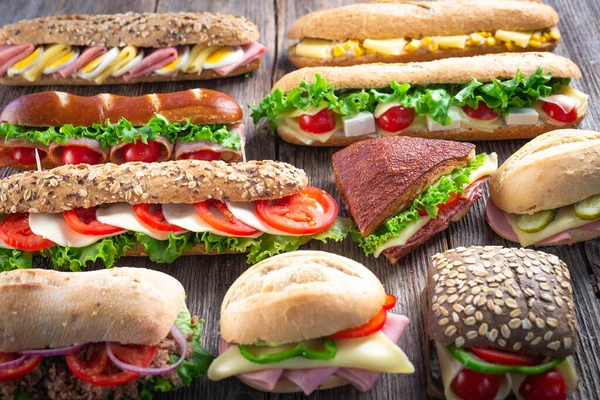 Assorted Sandwiches Wooden Background — Stock Photo, Image