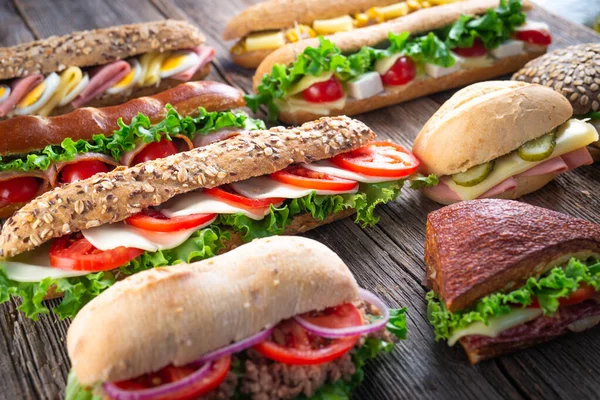 Assorted Sandwiches Wooden Background — Stock Photo, Image