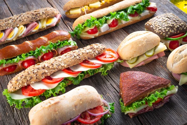 Assorted Sandwiches Wooden Background — Stock Photo, Image