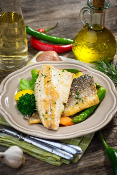 Sea bass fillet with vegetables — Stock Photo, Image
