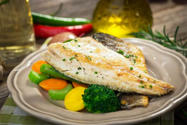 Sea bass fillet with vegetables — Stock Photo, Image