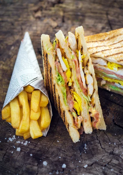 Club Sandwich and french fries — Stock Photo, Image