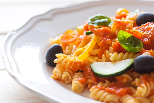 Pasta with basil and vegetables — Stock Photo, Image