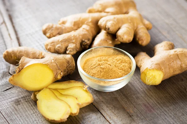 Ginger on wooden table — Stock Photo, Image