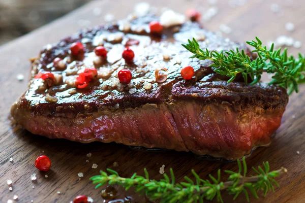 Red grilled stake with herbs — Stock Photo, Image