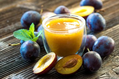 Glass with plum smoothie