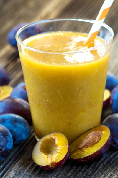 Glass with plum smoothie — Stock Photo, Image