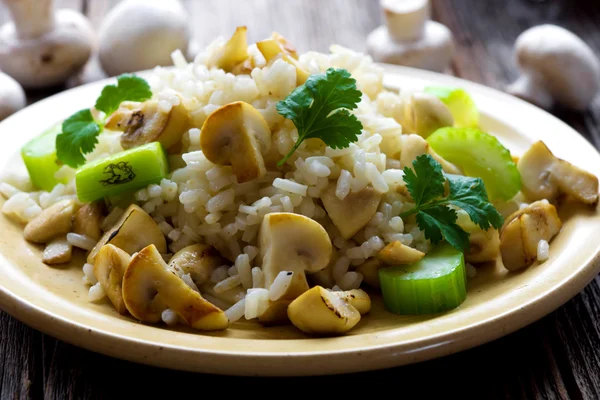 Risotto with mushrooms, coriander and celery — Stock Photo, Image