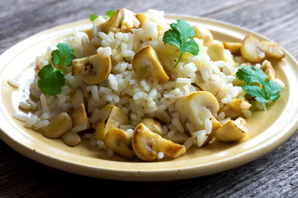 Risotto with mushrooms and coriander — Stock Photo, Image