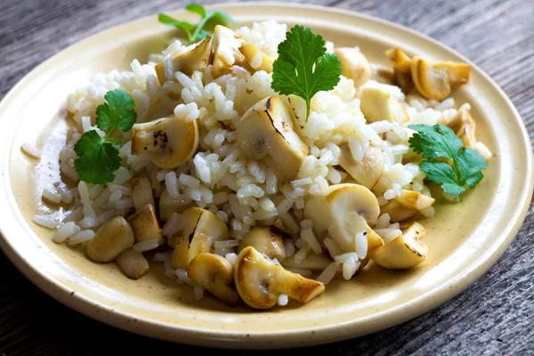 Risotto with mushrooms and coriander — Stock Photo, Image