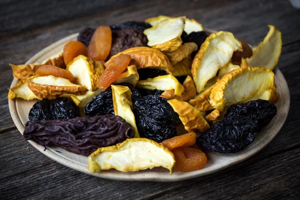 Dried fruits on plate — Stock Photo, Image