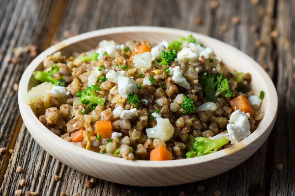 Buckwheat with vegetables and feta cheese — Stock Photo, Image