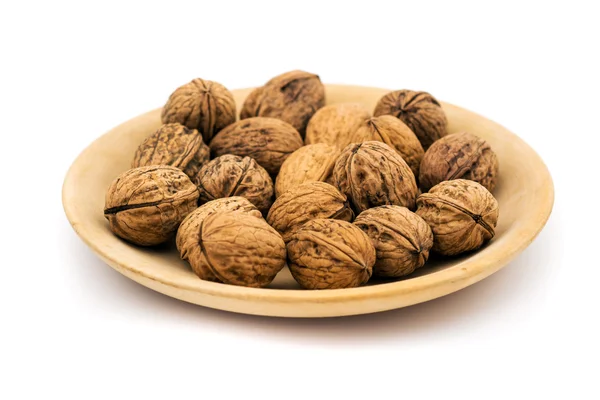 Fresh walnuts on a white — Stock Photo, Image