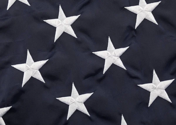 Šedá hvězda na modrém pozadí americká vlajka. — Stock fotografie