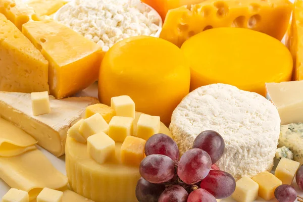Different Types Delicious Cheese Cheese Some Grapes — Fotografia de Stock