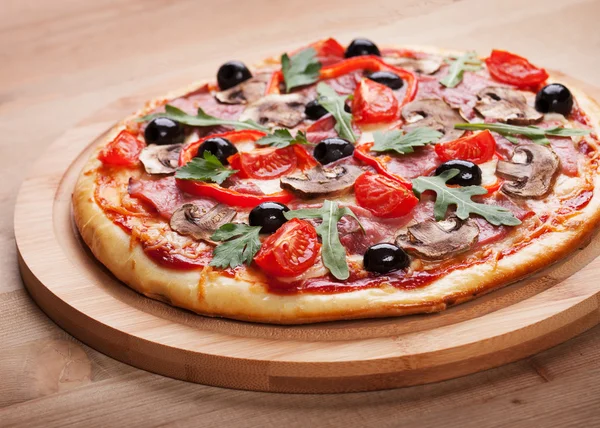 Delicious pizza with ham — Stock Photo, Image