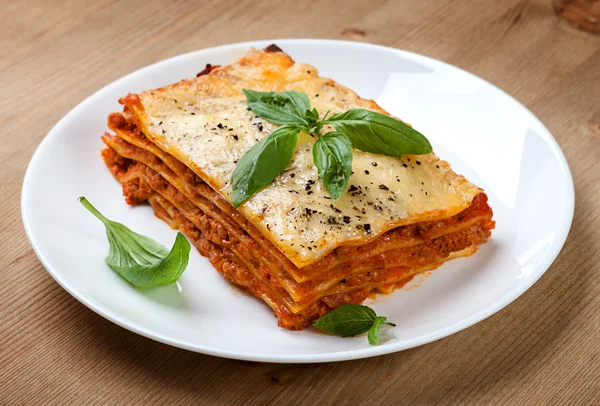 Tasty lasagna on plate — Stock Photo, Image