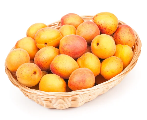 Apricots in wicker basket — Stock Photo, Image