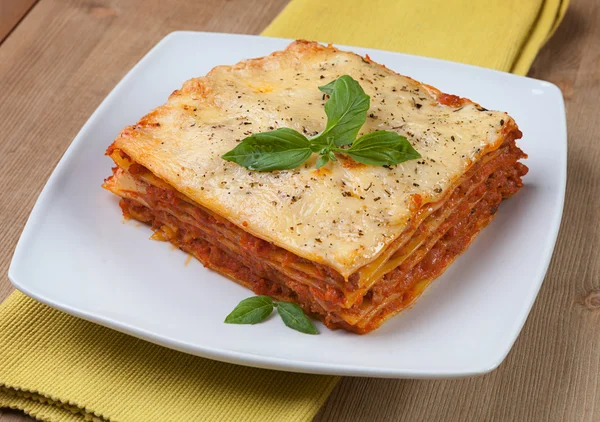 Tasty lasagna on plate — Stock Photo, Image