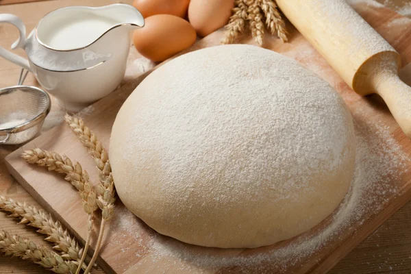 Fresh dough on the table — Stock Photo, Image