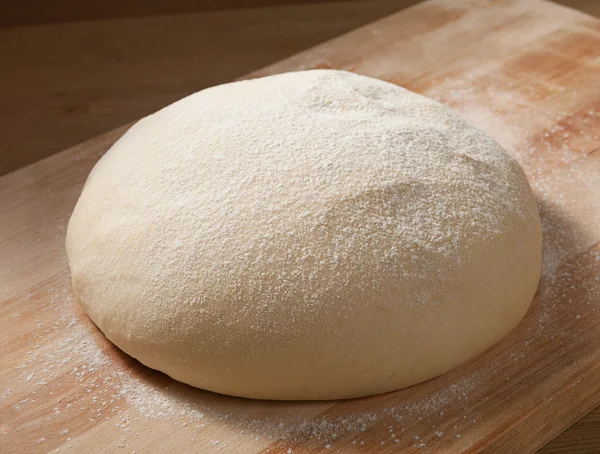 Fresh dough on table — Stock Photo, Image