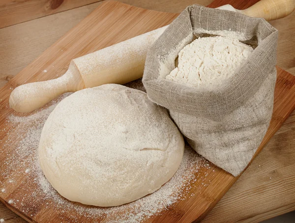 Fresh dough on table — Stock Photo, Image