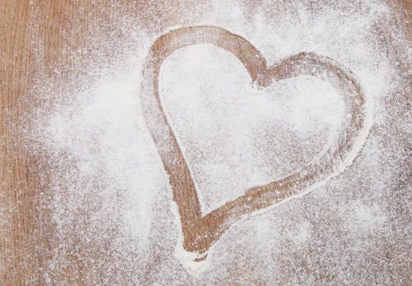 Heart of the flour on the table — Stock Photo, Image