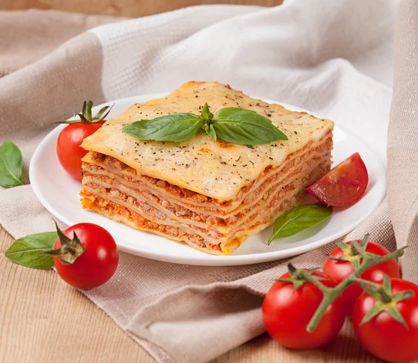 Tasty flavorful lasagna on plate — Stock Photo, Image