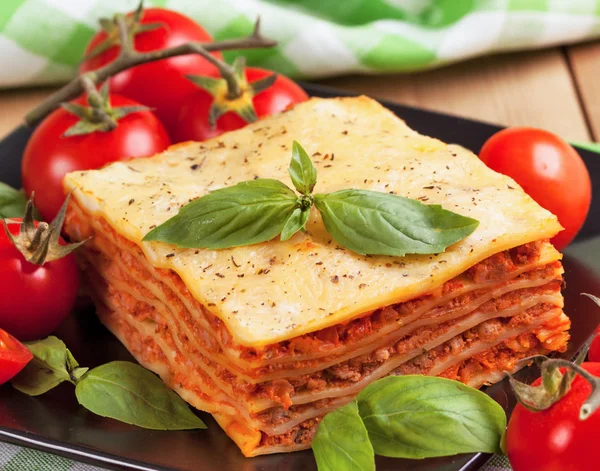 Tasty flavorful lasagna on plate — Stock Photo, Image