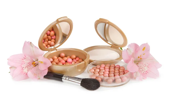 Cosméticos para maquillaje y orquídeas — Foto de Stock