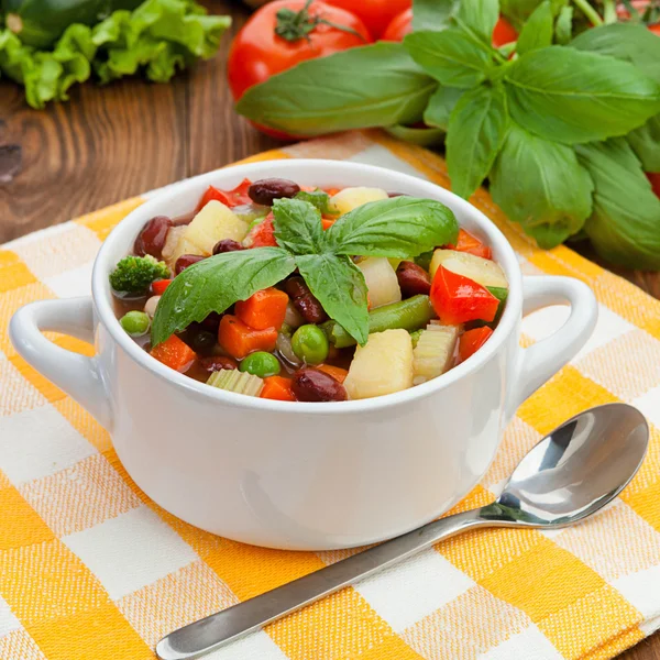 Minestrone in white plate — Stock Photo, Image