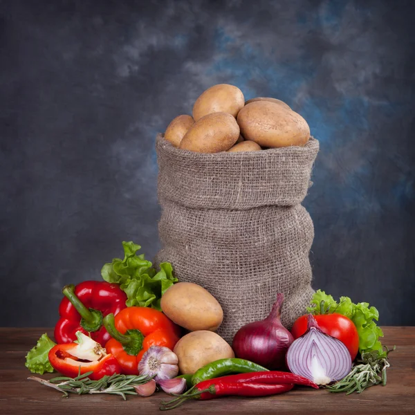 Potato and vegetables in bag — Stock Photo, Image