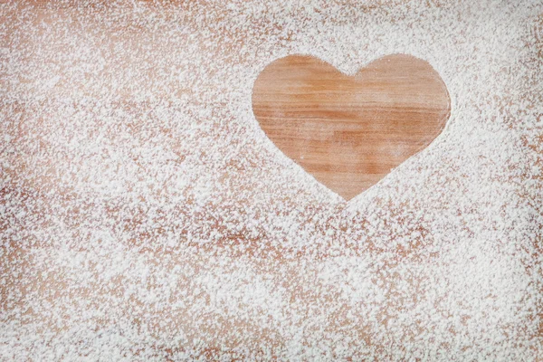 从旧板桌上面粉的心 — 图库照片