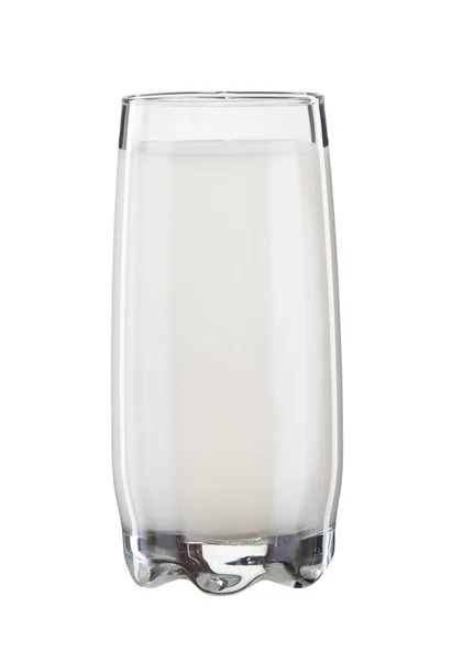 Leite em um copo isolado em um fundo branco — Fotografia de Stock